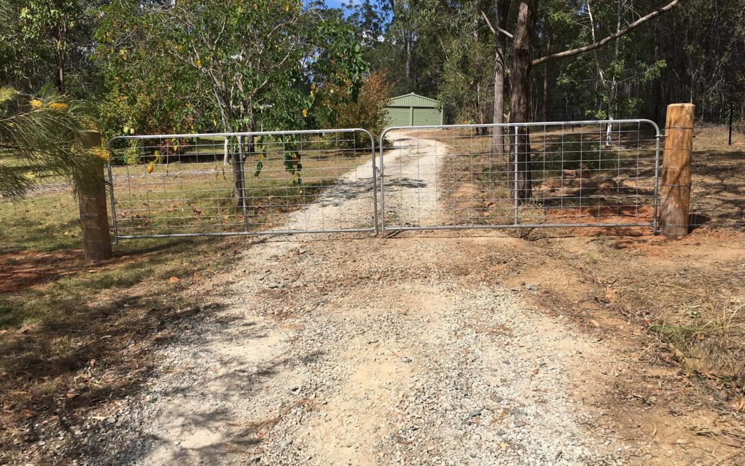 Dog fence with steel pickets