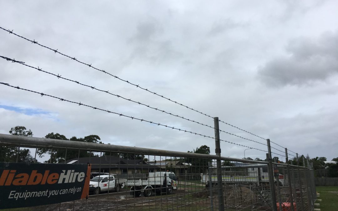 Barb Wire on Temporary Fence